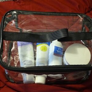 Clear Travel Toiletry Bag with Assorted Avon Foot Products